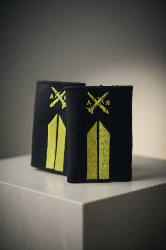 Brigada · Armas